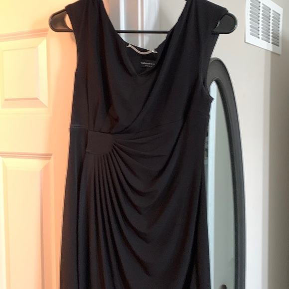 Dresses & Skirts - Black dress knee length! Very pretty with silver front accent.